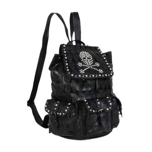 Fashionable Leather Men's and Women's Leather Backpack with Personalized Skull Head Rivet Inlaid Diamond Bag, School Bag, Computer Bag 240415