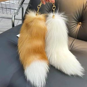 Real Fox Pur Tail Keychain Wolf Tail Tasel Bag Charm Tag preto e marrom Pom Charm Chairing Strap Chain Gifts 240402