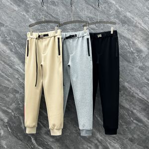 Calça masculina de marca de altura de moda costura de cinto de moda calça lápis de alta qualidade de luxo de luxo calças de grife