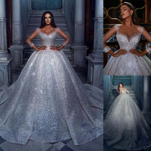 Wspaniała suknia balowa suknia ślubna Sheer szyi długie rękawy aplikacje ślubne suknie ślubne cekiny zamiatanie sukienki pociągu