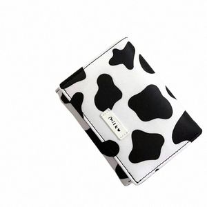 ny design kvinnor plånbok pu läder kartoko cow coatle korta damer multi-kort spelautomat pursar student söt trippel vikta plånböcker x0ye#