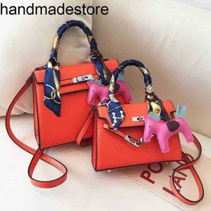 Bolsas de couro de grife kl paul senso alto estilo estranho no estilo portátil noiva vermelha saco de casamento feminino grande capacidade