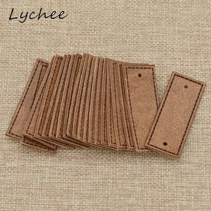 Lychee 20pcs classico marrone artificiale etichette per indumenti in pelle PU etichetta per sacche da cucito fai da te pantaloni per decorazioni per decorazioni