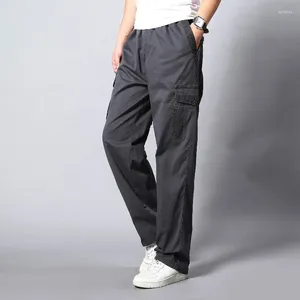 Pantaloni da uomo primaverile autunno alto con tasche solide con cerniera elastica ricamo di giunzione elastico pantaloni per gamba dritta casual