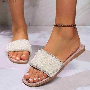 Slippers Sandals Internet famous pearl flat bottomed casual sandals 2024 summer new womens slippers Korean version square head straight line beach H240410