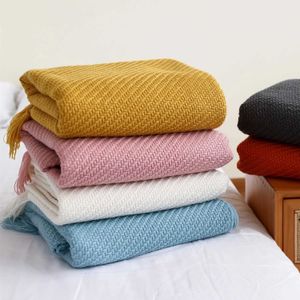 Coperte Nuova coperta a maglia moderna nordica con nappa per il divano da letto a colori solidi Air aria bohémien morbida tv tv comodo lancio coperta