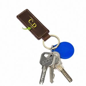 benutzerdefinierter Name echter Lederschlüsselhalter Frauen Männer Schlüsselkette Home Key Ring Cowide Auto Schlüsselbund Geschenk mit mogrammierten Buchstaben 63vo#
