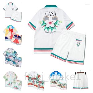 Męskie dresy tenisowe kwiaty paski mężczyźni kobiety krótki zestaw t Shrt Hawaii plażowy garnitur Hip Hop Shirt Para garnitury casa