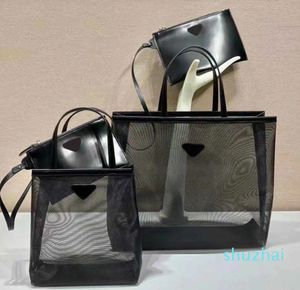 Bolsas de malha de praia Totes Bolsas de grife feminino Luxuris de luxuros de sacolas de malha maquiagem portátil de ombro único Bolsa de bola de praia Bolsa de lavagem feminina Bolsas femininas