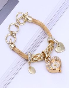 Avanadores de pulso relógio de diamante Peach Heart Bracelet Band Pingente de malha de malha Love Retro Stapless Strap7984049