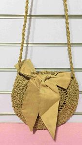 Cross Body Totes Korean version large bow round bag paper rope crochet fashionable straw woven new and versatile casual womens H240410