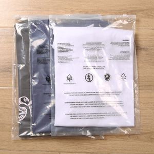 STOBAG 50PCS Прозрачная сумка -молния Упаковка для одежды с предупреждающими словами запечатанные чистые рубашки на молнии многоразового хранения