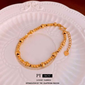Verklig guldelektropläterad antik vintage prismatisk pärla fashionabla mångsidiga armband, lätt och avancerad känsla för kvinnors handtillbehör