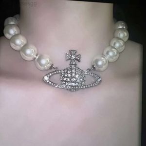 Designer Viviane Westwood Empress Dowager Xis Oversized and Exaggerated Pearl Saturn Studded Diamond Necklace Featuring a Highend Planet Pearl Collarbone Chain f