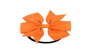 20 färger 8cm solid cheerleading band bågar grosgrain cheer bows slips med elastiska band flickor gummi hårband tfj4438093370
