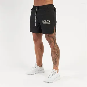 Pantaloncini da uomo Essiccante rapido Freight Basket Casual Basket Outdoor Pantaloni da spiaggia traspirante in palestra che corre in palestra