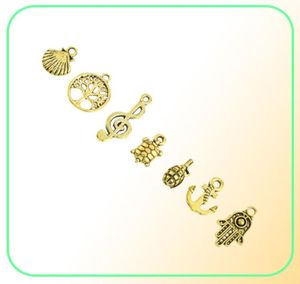 Blandade mönster Retro Golden Color Key Rudder Shell Turtle Bird Hand Tower Cykel Butterfly Owl Charms för DIY -smycken som passar 50PC3779304