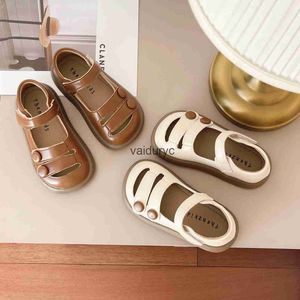 Sneakers Korean 2024 Summer Infant e Toddler Hollow Roman Sandals for Girls Sof Sole Baotou Leather Shoes confortável H240411