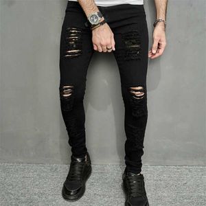 Herrbyxor streetwear mens fashionabla hål svart tight jeans mens vår jogging casual blyerts denim byxor herr byxor j240409