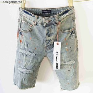 Lila Marke Denim Shorts mit amerikanischen Grandkanten und Löchern gelbe Schlamm -Denim -Shorts gewaschen
