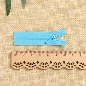 5pcs/conjunto 5*1,7 cm Mini zíper de roupas Apliques de traje de boneca Zippers de costura artesanal Scrapbooking Diy Clothes Acessório Vendas quente