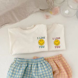 ズボンのズボンの夏の服の女の薄い綿の手紙プリント +格子縞のppショートパンツボーイスポーツセット