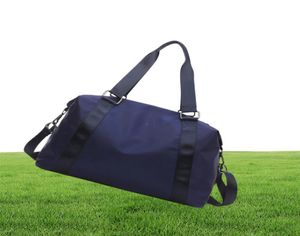 203 Handväska Yoga Duffel Bag Kvinnlig våtvattentät stor bagage Kort resväska 50*28*22 Hög kvalitet med varumärkeslogo1677810