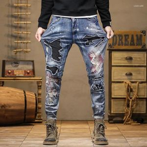 Jeans de calça jeans Contraste de retalhos de retalhos bordados As calças bordadas da primavera e do outono, tornozelo, jeans de motocicleta de rua amarrada