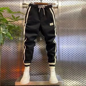 Herrenhosen Outdoor Jogger Jogginghose Schwarz gestreifte Hosen Freizeit Harem Modekleidung