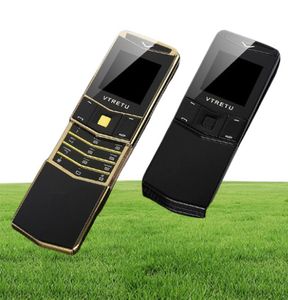 Nowe odblokowane luksusowe złote telefony komórkowe Slider Slider Dual Sim Card Telefon komórkowy Ciało ze stali nierdzewnej mp3 Bluetooth 8800 Golden ME3045911