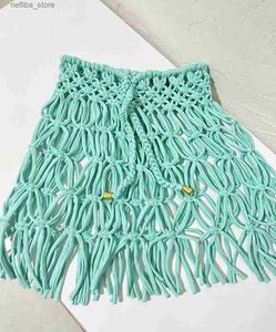 Saia sexy Beachapche Hand Crochet Tassel Mini Shairs Mulheres Moda Y Side High Knit