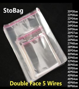 StoBag 100pcs Clear Self Adhesive Cello Cellophane Bag Self Sealing Plastic Bags Clothing Jewelry Packaging Candy OPP Resealable Y4551487
