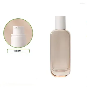Förvaringsflaskor 100 ml Guldglasflaska Vit pump Serum/Lotion/Emulsion/Foundation/Essence Toalett Toner Vatten Skinvård Kosmetisk förpackning