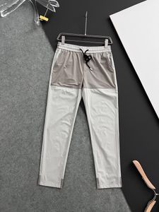 Brand maschi di fascia alta sport di fascia alta e pantaloni da corsa maschili e donne per il tempo libero pantaloni in bianco e nero pantaloni elastici alla moda pantaloni sportivi M-3xl