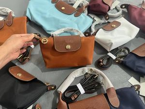 Designer väska kvinna nylon kosmetiska väskor totes axelväskor handväskor plånböcker