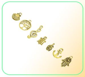 Designs mistos Retro dourado -dourado chave de leme casco Tartaruga pássaro torre de bicicleta Butterfly Charms para jóias DIY Ajuste 50pc5400577