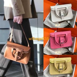 Borse Halzan Borse in pelle Crossbody 2024 Autunno e inverno Nuova sacca a ferro di cavallo bovina per spalla da portata unisex unisex Design un unico penut di moda ha logo HBIW