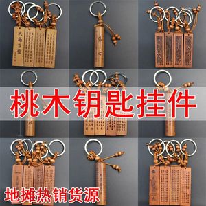 Brincos de colar Conjunto por atacado de chaveiros de madeira de pêssego e pingentes de fabricantes Fonte Escrituras Lengyan Mantra Auspiciosidade