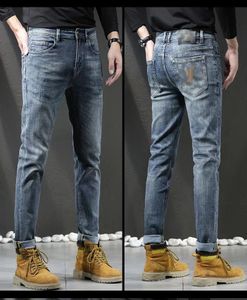 Lila varumärke jeans designer europeisk höst och vinter ny produkt hög kvalitet stor ko smal passar små fötter långa byxor män tätt marinblå lång rak rippad