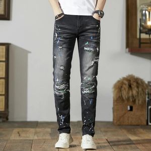 Jeans da uomo strappato fresco marchio di moda retrò di moda slim e stretching pantaloni motociclistici stampati