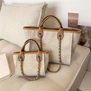 Xiaoxiangfeng Canvas Women's Solid Color Chain Crossbody Handheld Carrying and Small Capacity Tote Bag 78% Off Store wholesale