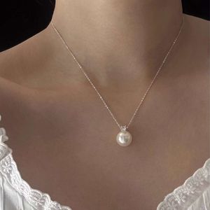Prinsessan Diana Swallow Pearl French Classic Luxury Mångsidig sterling silverhalsband/örhängen för kvinnor