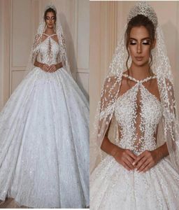 2020 Luxury Ball Gown Wedding Dresses Spaghetti Strap Sleeveless Beaded Appliqued Sequins Bridal Gown Ruffle Sweep Train Robes De 7890360