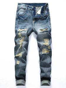 Os jeans masculinos rasgaram os jeans desgastados, que parecem elegantes se sentem confortáveis!