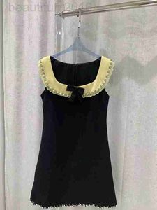 Basic & Casual Dresses designer Summer New Bow Tie, Square Diamond Buckle Waistband, Gentle and Comfortable Black White Color Blocked Short Sleeve pleated Dress UEI9