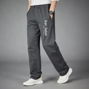 Calça masculino esportista de corrida ginástica de ginástica de ginástica de fitness cilicismo calça de moletom de letra de calças impressas de trajes de tilhas de movimentação