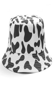 Ins niedliche reversible schwarze weiße Kuhdrucken Muster Bucket Hüte Frauen Sommerfischerhut Zwei Seitenfischer -Mütze Panama15833388