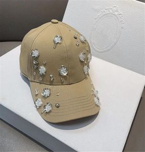 Top Caps 202403-Shi Ins Yay Tasarımı Saf Manuel Dikiş Pullu Çiçek Çiçek Kriyet Bead Lady Beyzbol Şapkası Kadın Eğlence Visörleri Kapağı