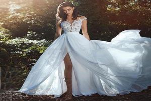 New Gorgeous Beach Wedding Dresses Sheer Neck Cap Sleeves Appliques Lace Chiffon Side Split Illusion Back Boho Wedding Gowns Brida1999474