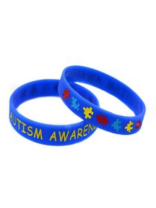 50pcs Autismusbewusstsein Silikon Gummiarmband Debossed und ausgefüllt in Farbsaw Puzzle Logo Erwachsener Größe 5 Farben 531496555121438